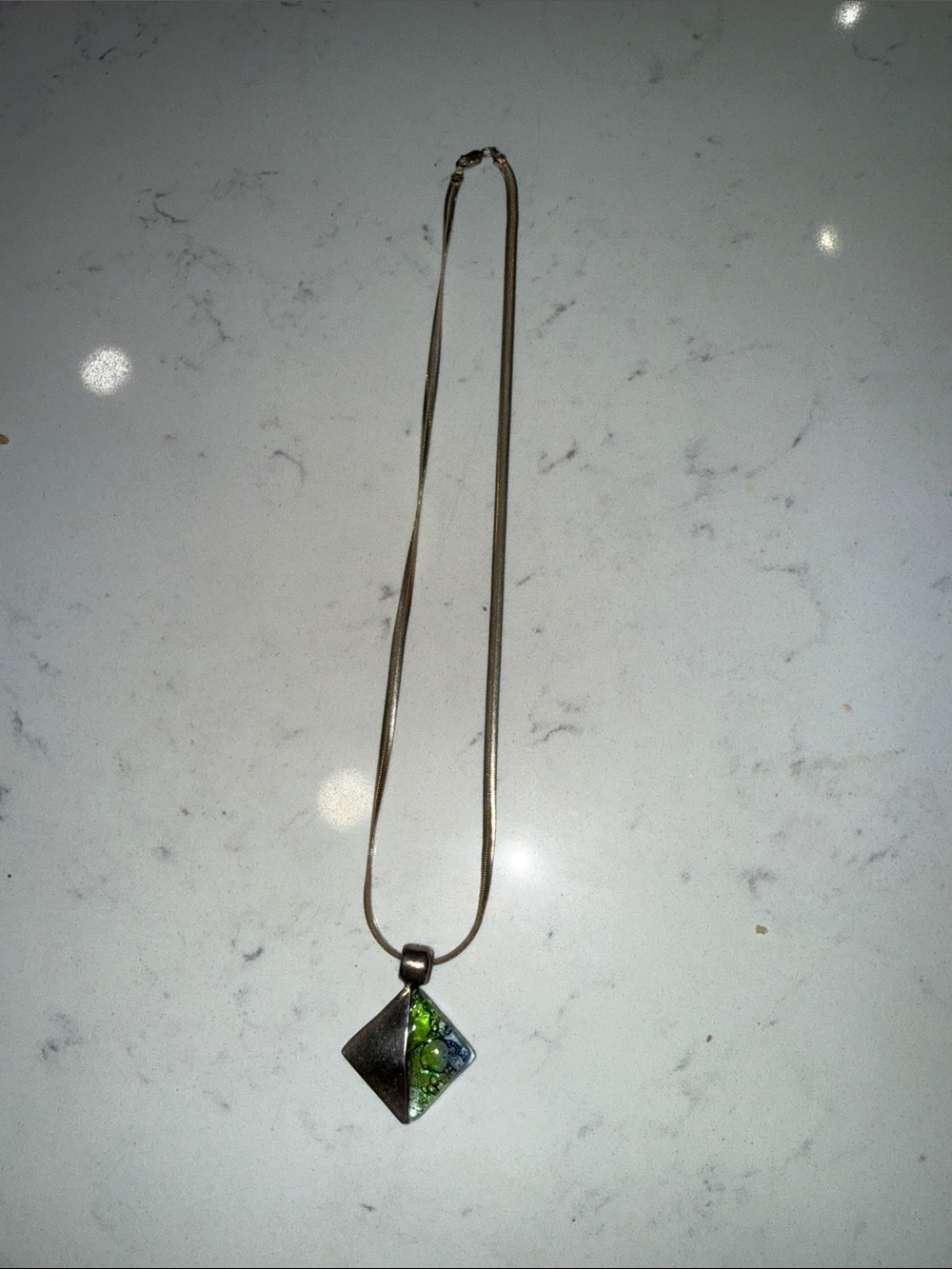 Silver Pendant Necklace with Green Accent Stone